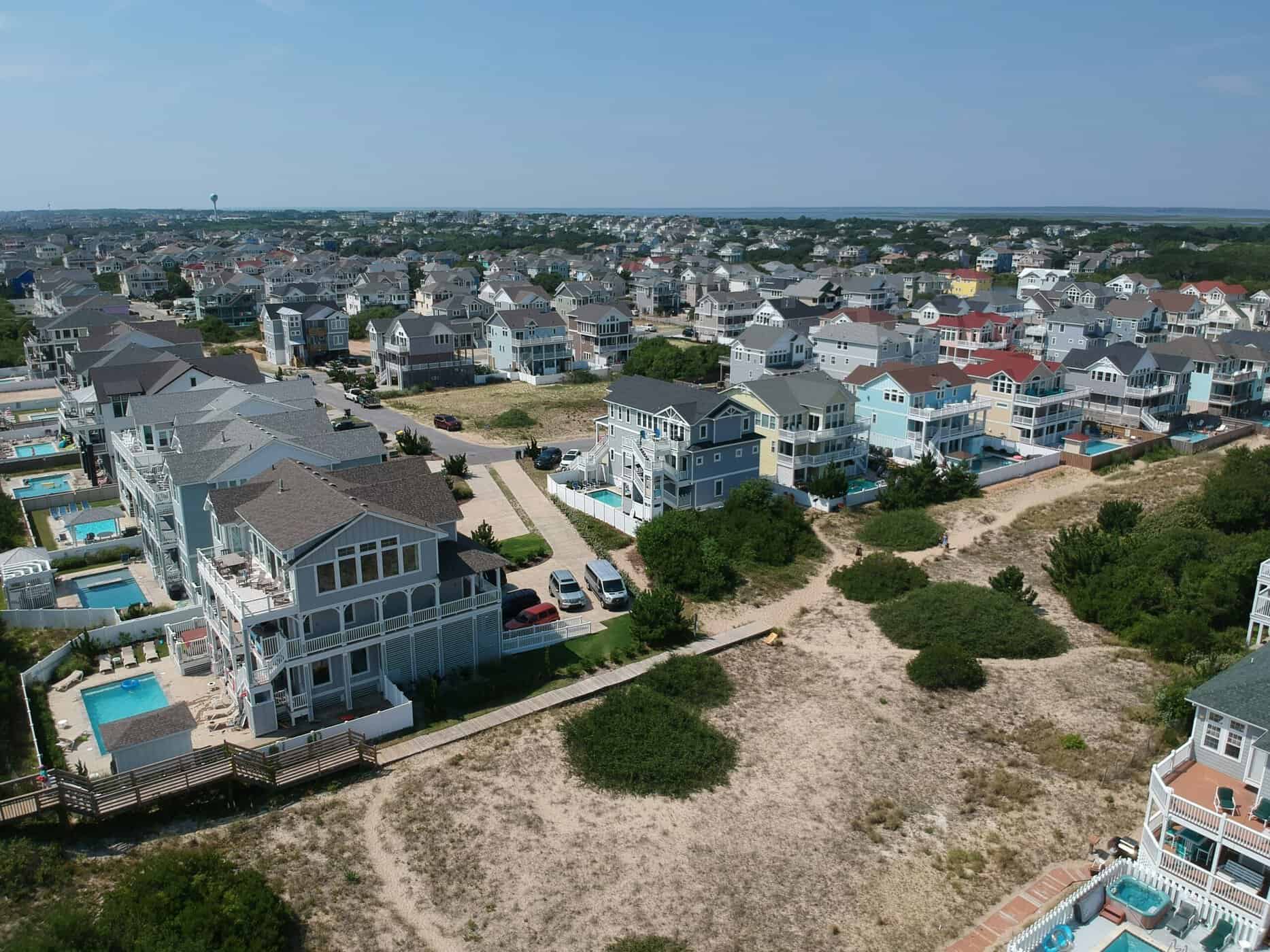 Aerial view of Nags Head vacation rental homes with private pools OBX